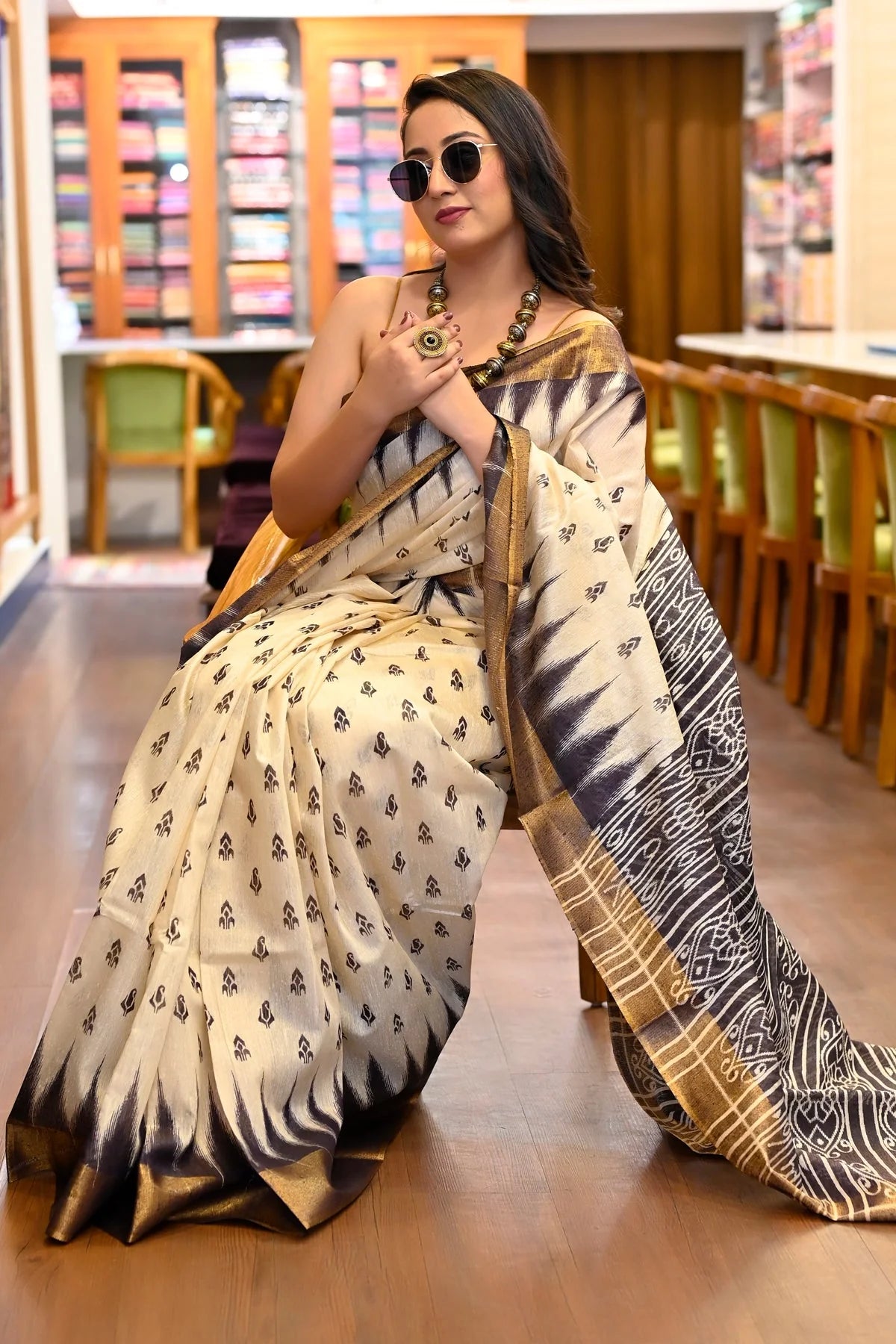 CREAM AND NAVY BLACK SILK SAMBALPURI HANDLOOM SAREE TEMPLE BORDER